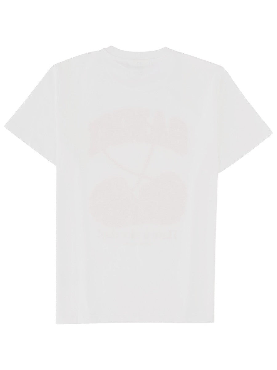 White GANNI T-shirt shown from the reverse side, with the cherry graphic softly visible through the cotton