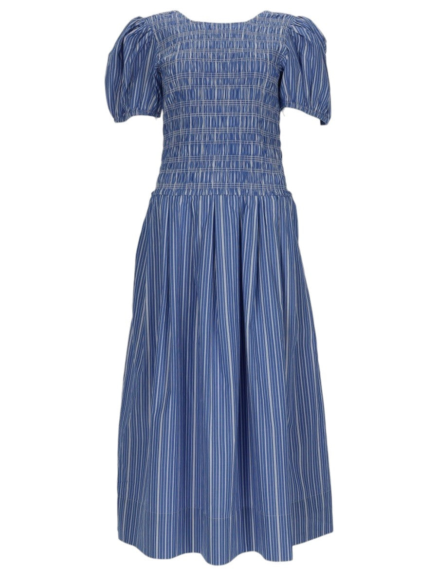 Front view of GANNI blue striped cotton dress with smocked bodice, square neckline and puff short sleeves