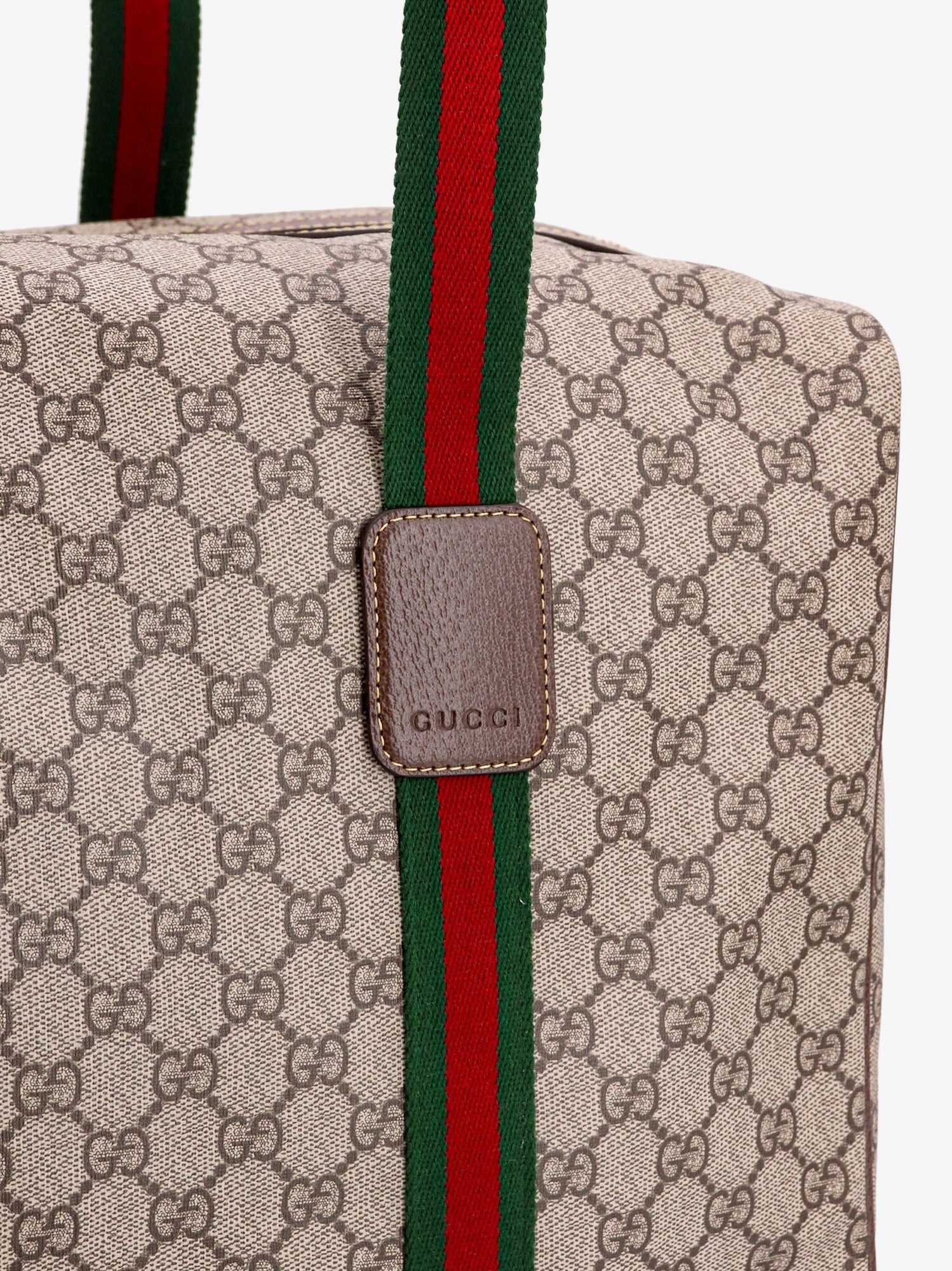 Gucci Gucci - GG Supreme Fabric and leather travel bag with Web detail