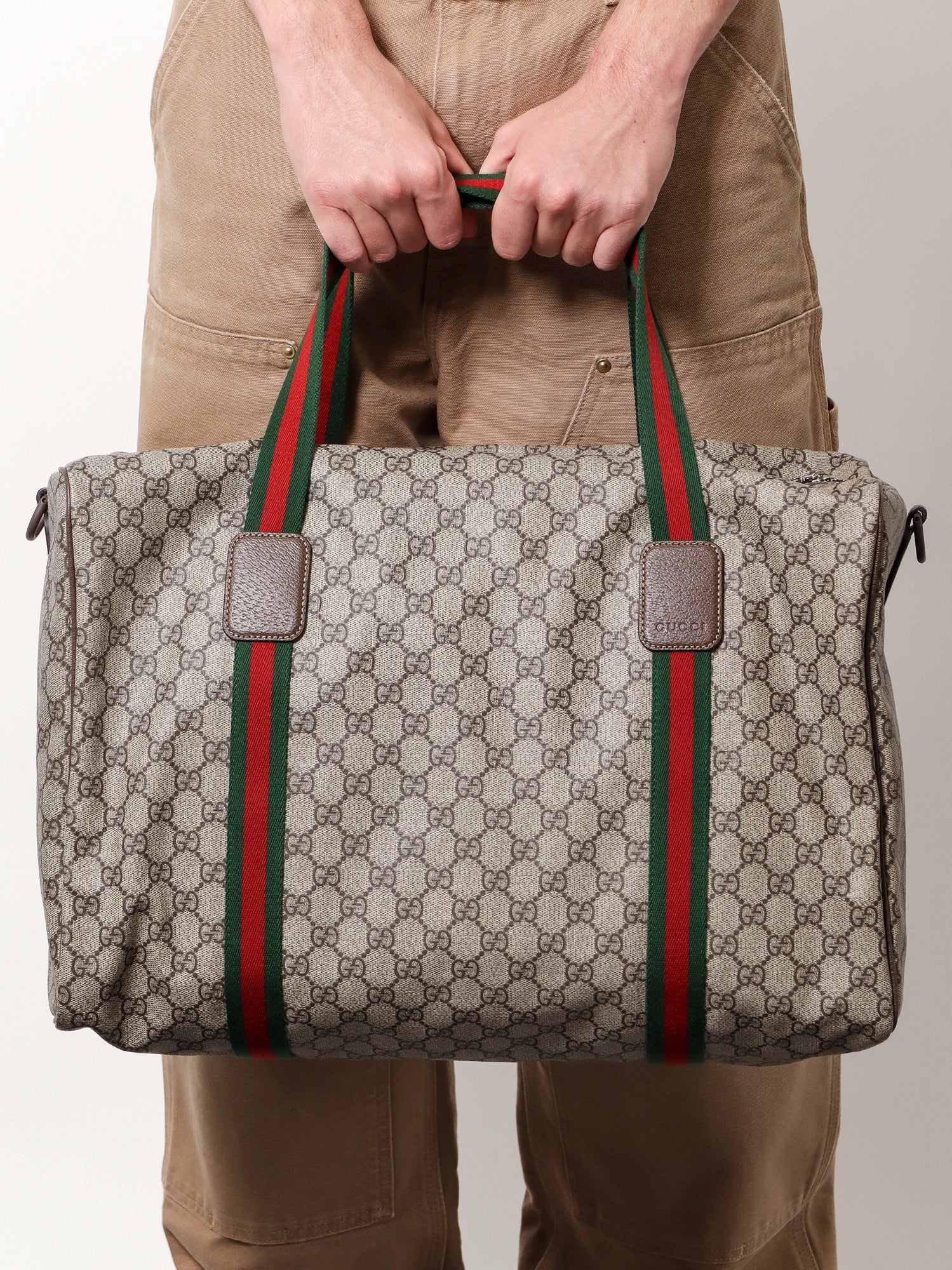 Gucci Gucci - GG Supreme Fabric and leather travel bag with Web detail