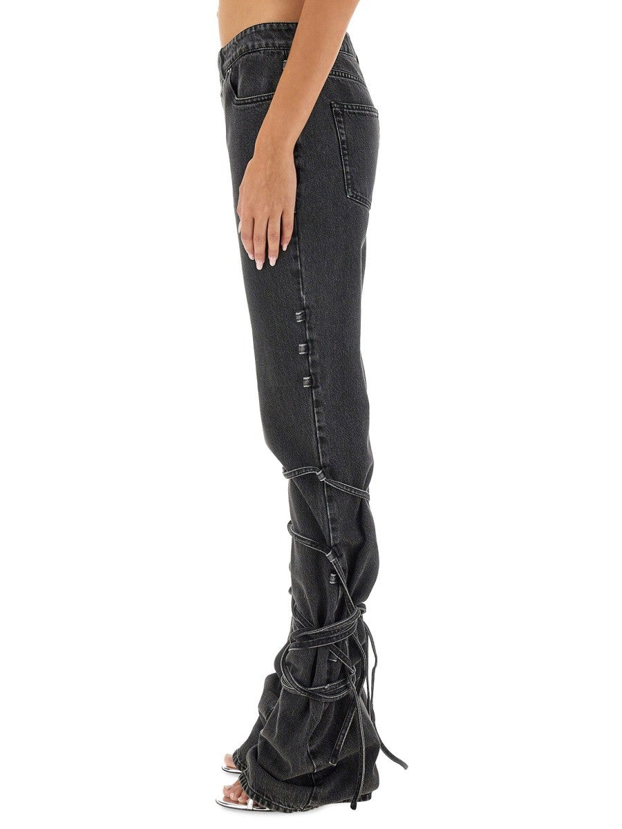 JEANS WITH KNOTTED DETAIL