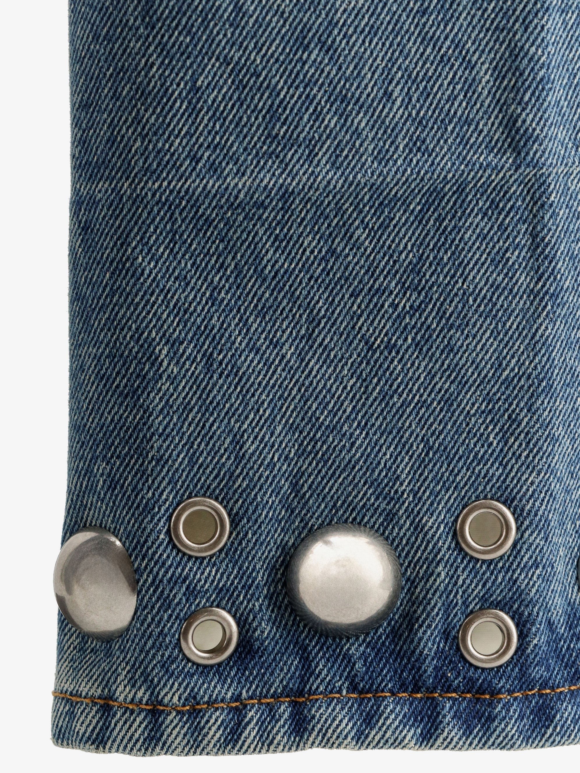 Jeans with metal details