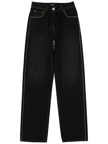 Versace - JEANS WITH STUDS AND CRYSTALS DECORATION jeans-with-studs-and-crystals-decoration_e61456bb-127c-4a99-96d9-0c39dda3bfa2