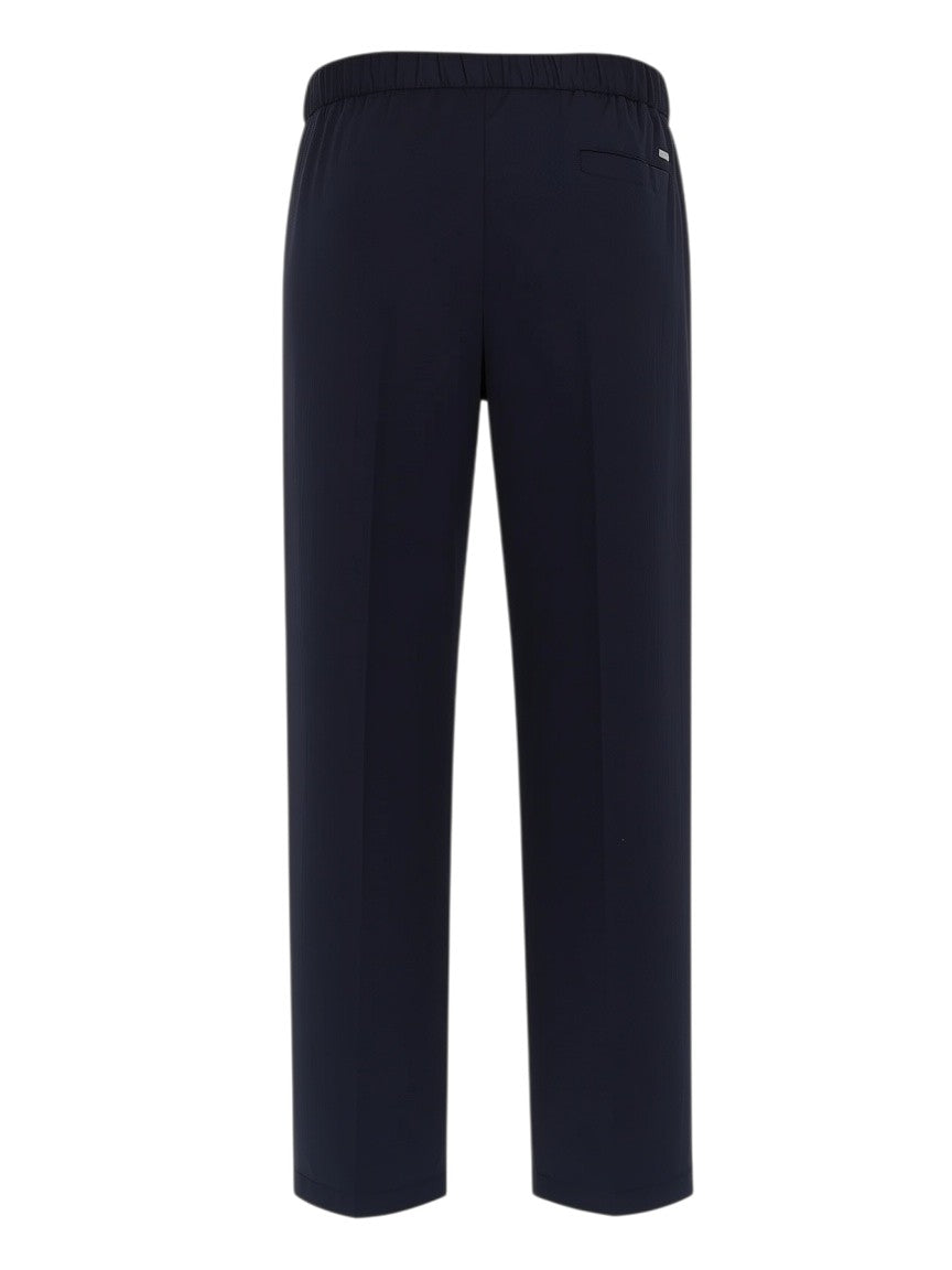 Klosmo Herno navy blue elasticated trousers made from a polyamide blend with a comfortable pull-on waistband.