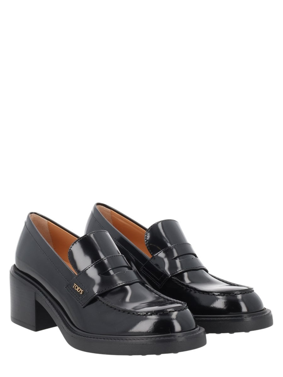 TOD'S - MOCASSINO IN PELLE klosmo-tods-black-leather-heeled-loafers_abd0fcc8-4534-49bd-a0af-149175b12339