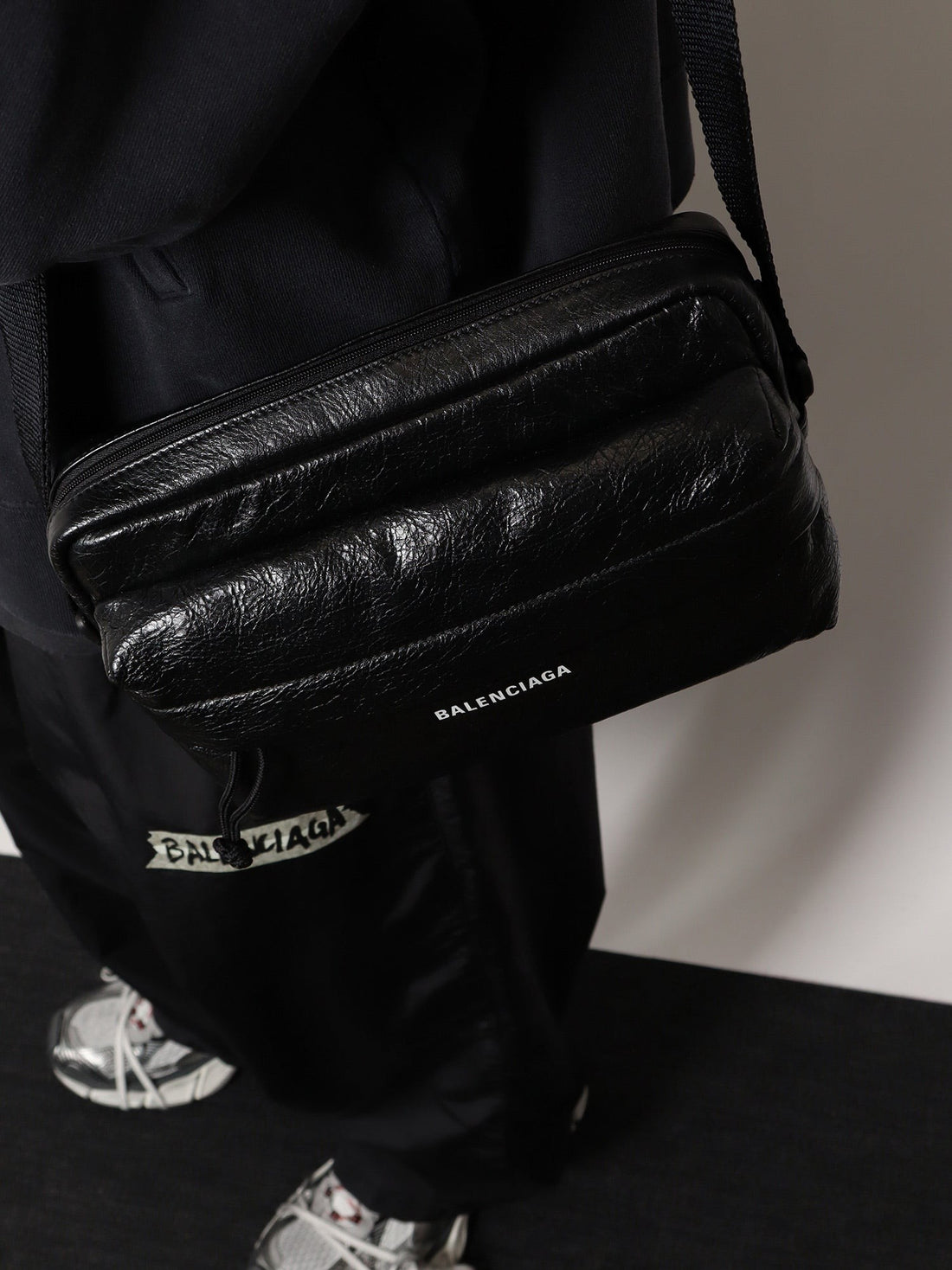 Leather crossbody bag with logo on the front