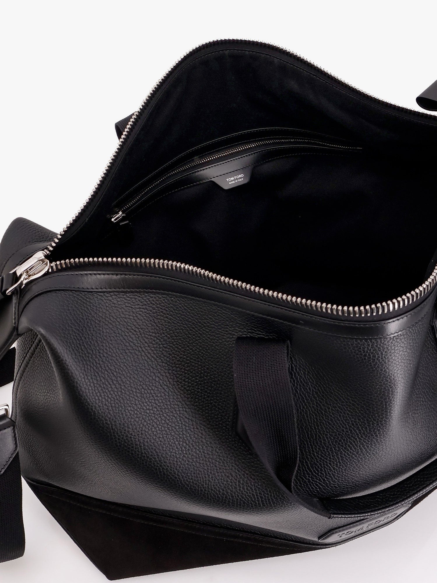 Leather duffle bag with suede inserts and logo patch