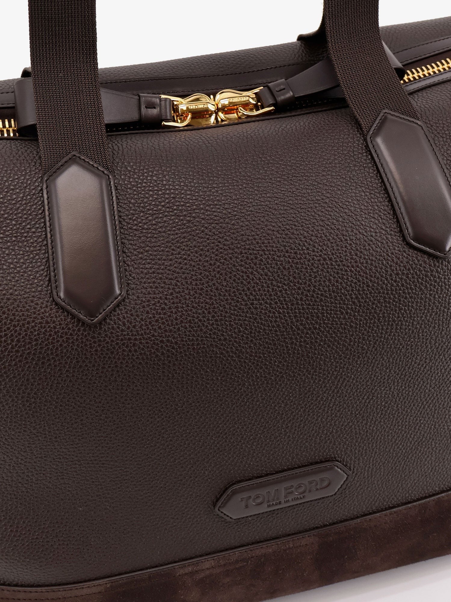 Leather travel bag with suede inserts