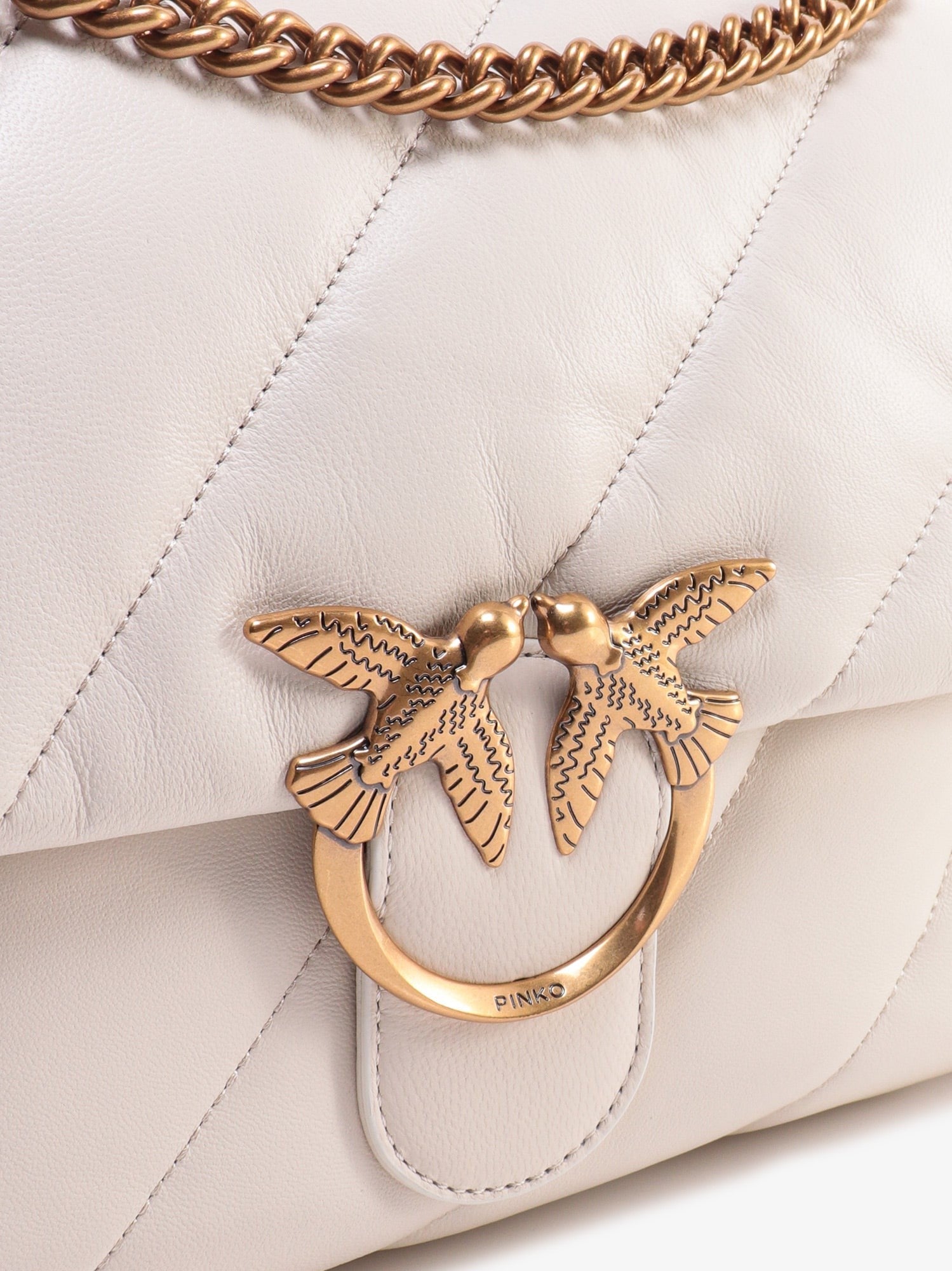 Matelassé leather shoulder bag with iconic love birds buckle