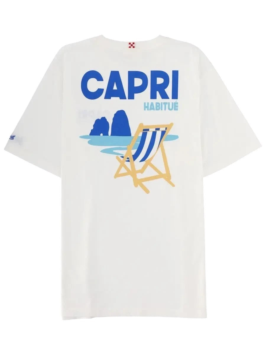 MC2 Saint Barth Capri Habitué white graphic T-shirt with large Capri beach chair print, blue logo lettering, short sleeves and crew neck.