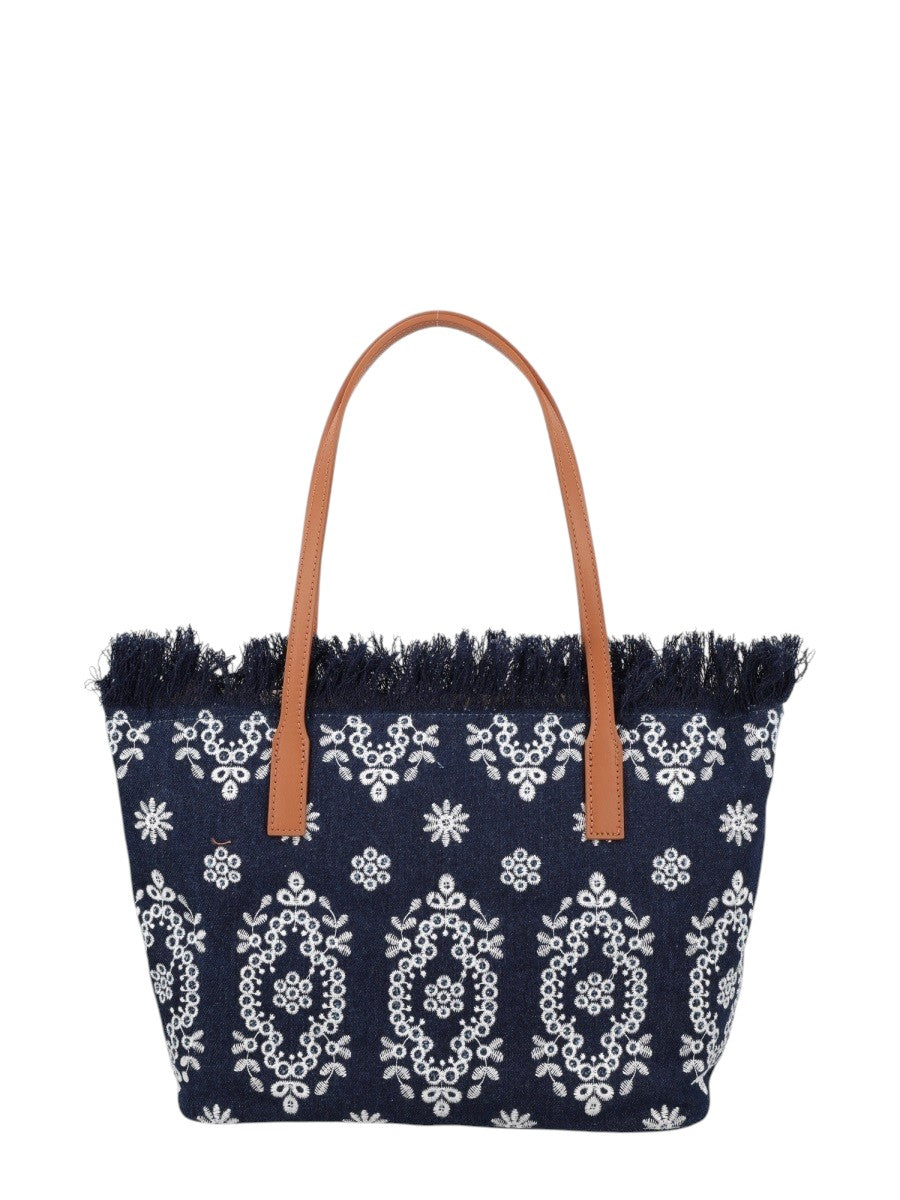 MC2 Saint Barth City Medium navy blue canvas tote bag featuring white embroidered ornamental motifs, frayed top edge and tan leather shoulder handles.