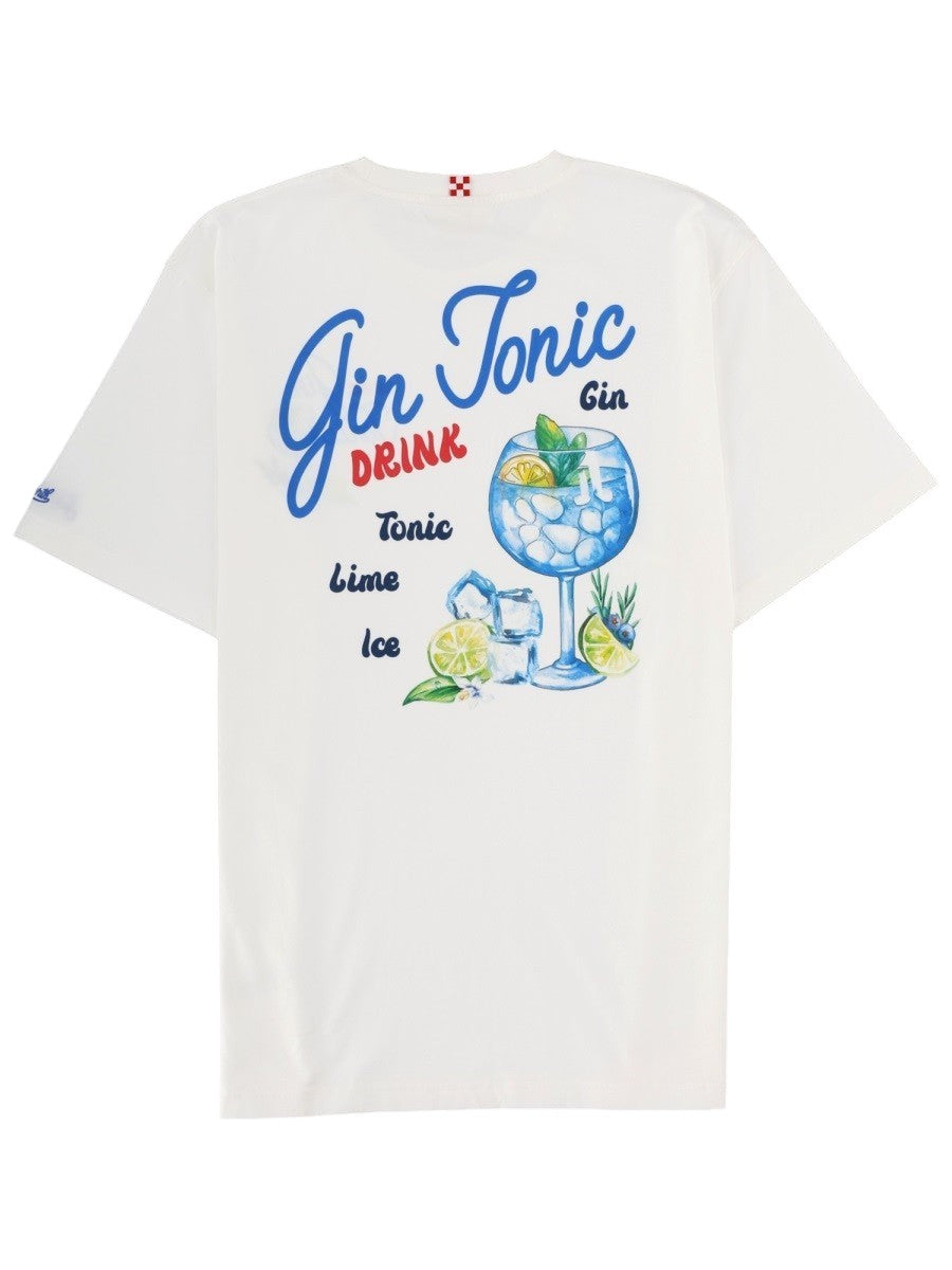 Back view of MC2 Saint Barth white cotton T-shirt featuring a large Gin Tonic cocktail graphic print with blue lettering and citrus illustrations.