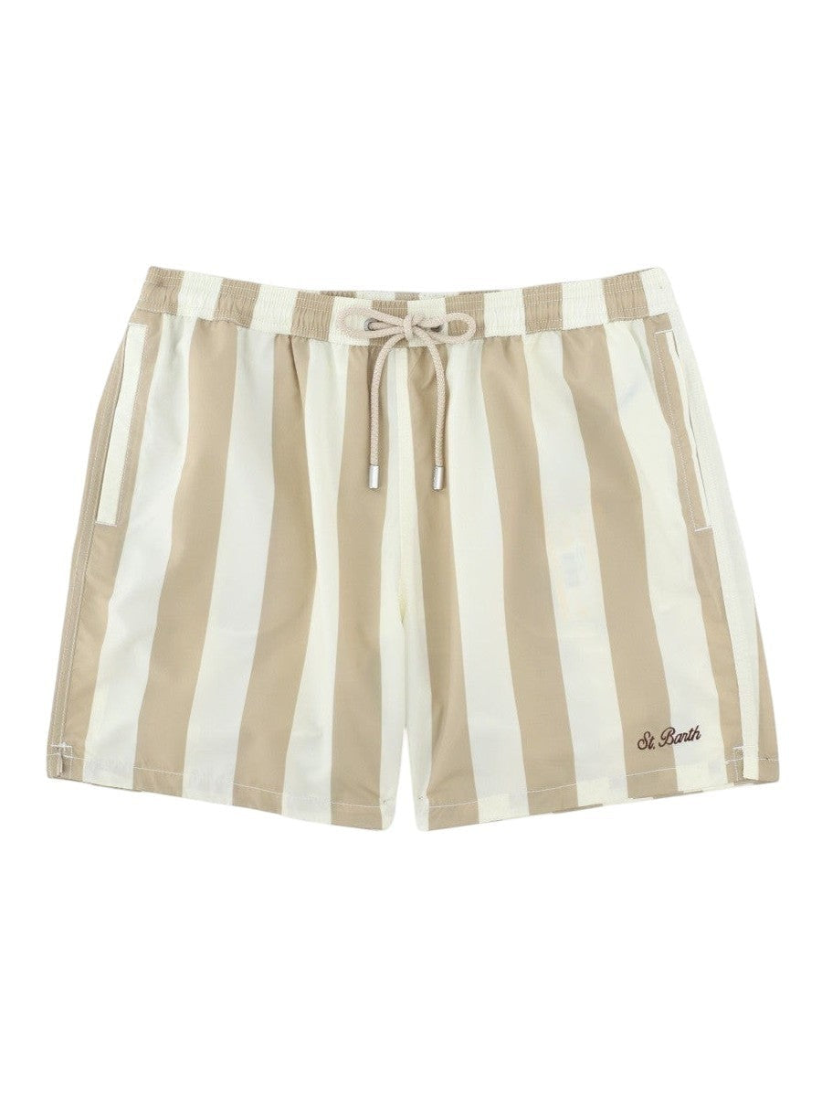 MC2 SAINT BARTH men's swim shorts with beige and white vertical stripes, drawstring waistband and St. Barth embroidery near the hem.