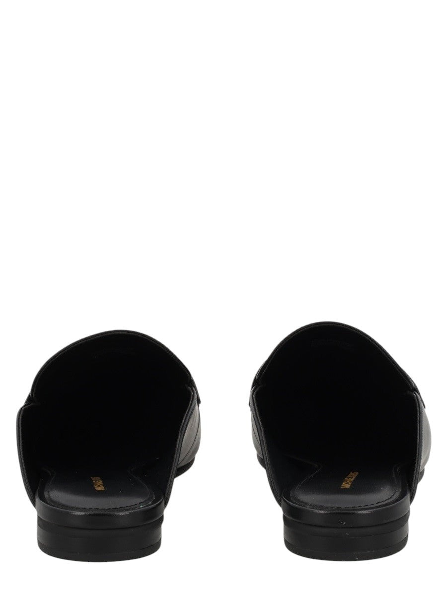 MICHAEL BY MICHAEL KORS - SABOT "MCKENZIE" IN PELLE michael-kors-mckenzie-leather-mules-black-back-jpg