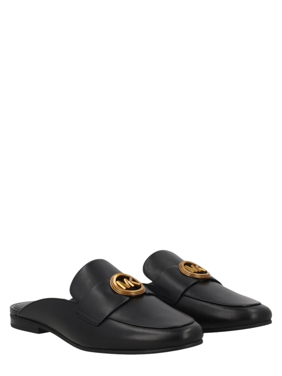 MICHAEL BY MICHAEL KORS - SABOT "MCKENZIE" IN PELLE michael-kors-mckenzie-leather-mules-black-three-quarter-jpg