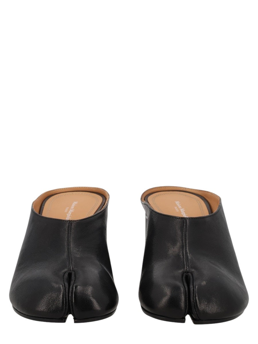Maison Margiela black leather Tabi mule shoes with split toe and 6cm heel.