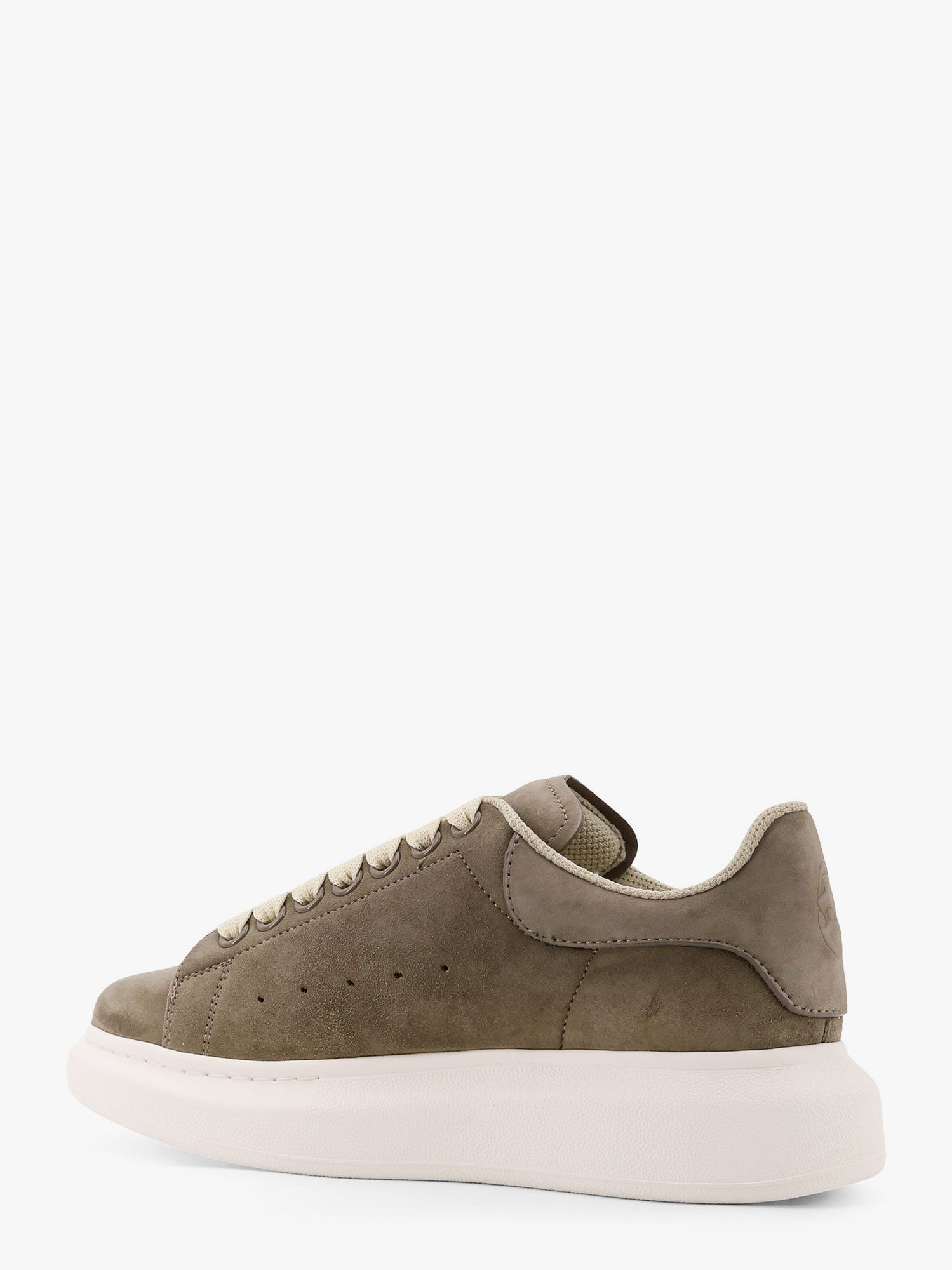 Oversized suede sneakers with engraved logo on the front