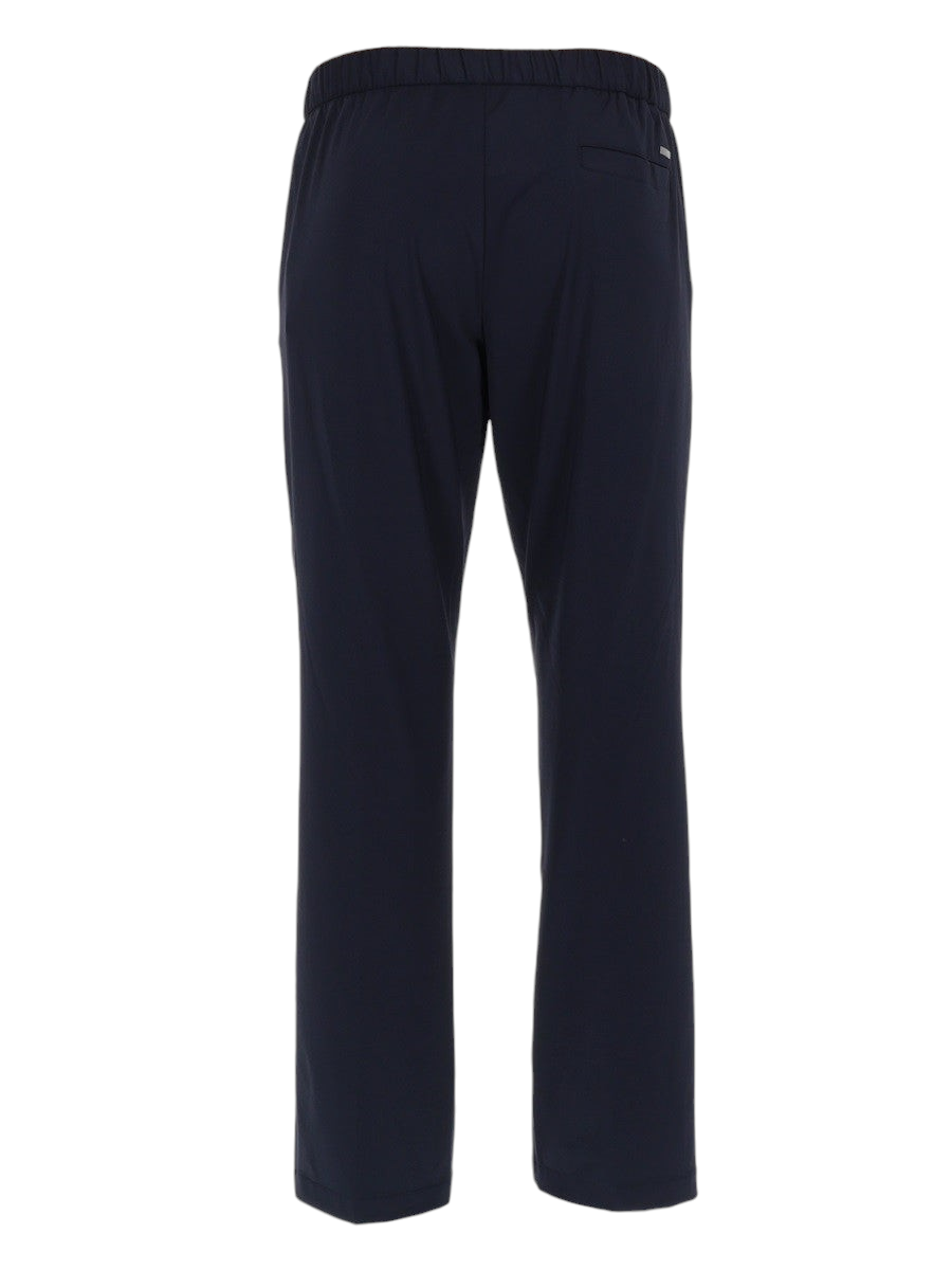 Herno men's navy blue stretch trousers, front view, crafted from polyamide and elastane technical fabric, Made in Italy luxury designer menswear.