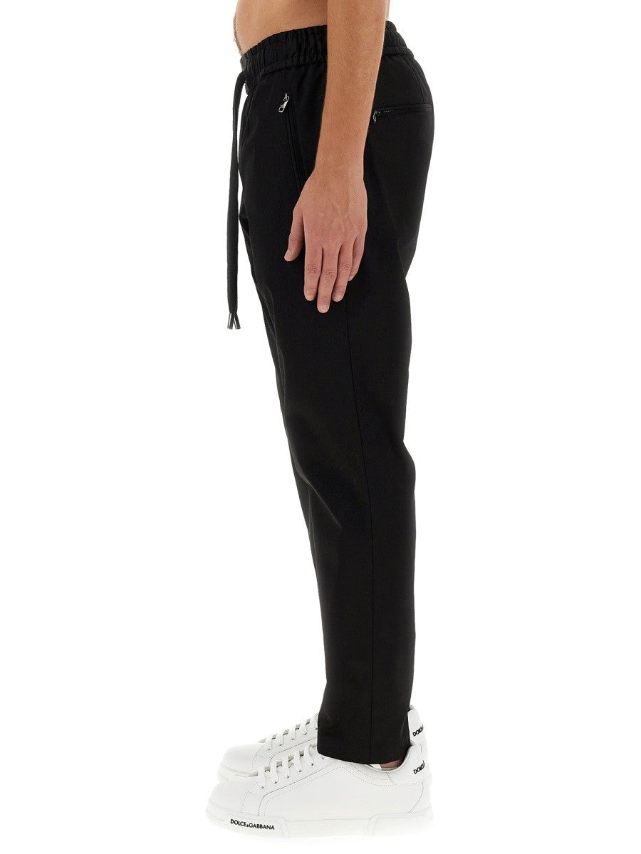 JOGGING PANTS WITH PLAQUE