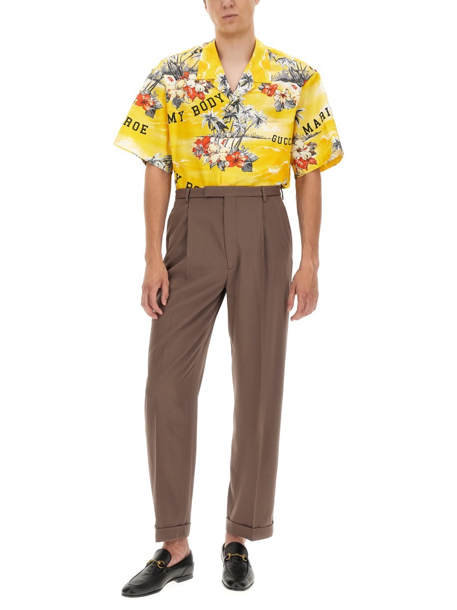 PANTS WITH GUCCI LABEL