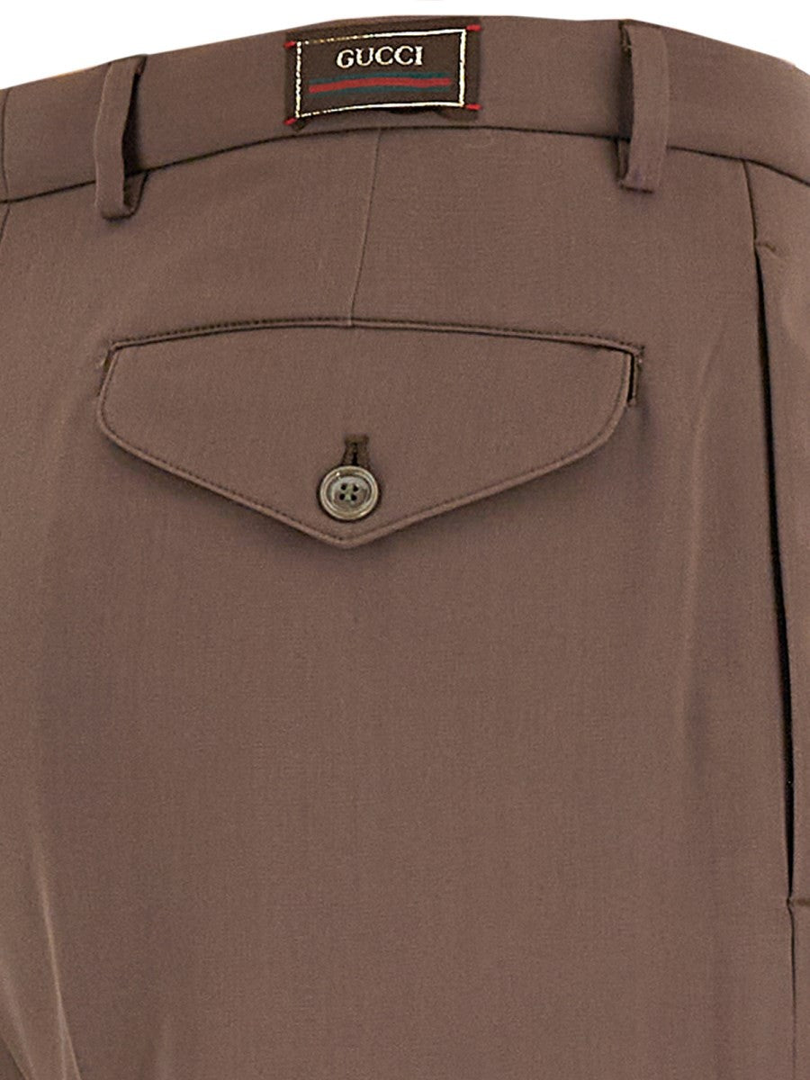PANTS WITH GUCCI LABEL