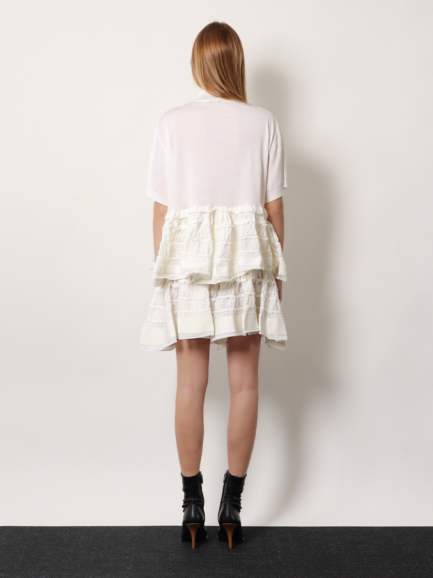 ALAIA - Peplum virgin wool sweater