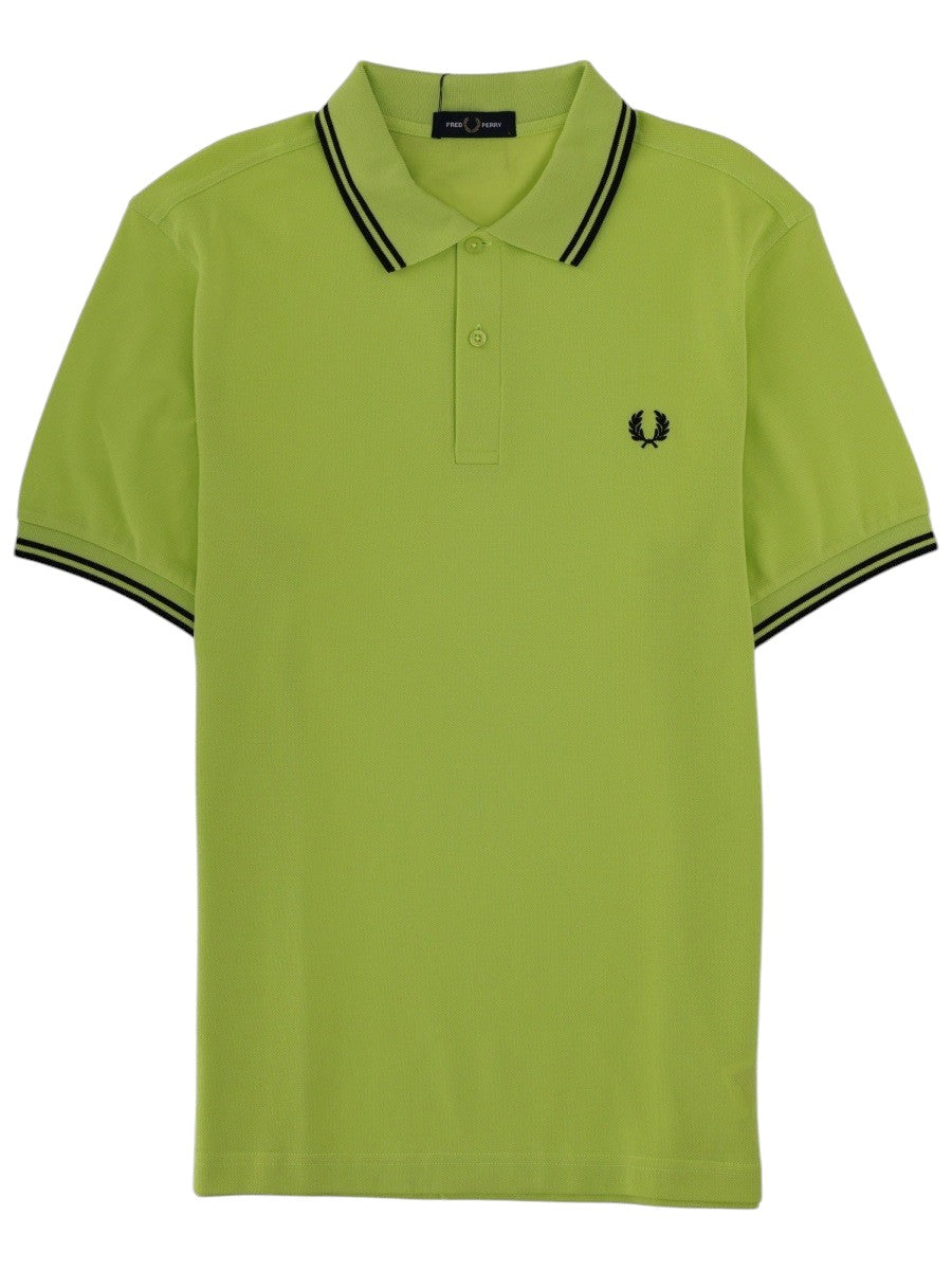 Fred Perry Green polo shirt with black stripes and black logo