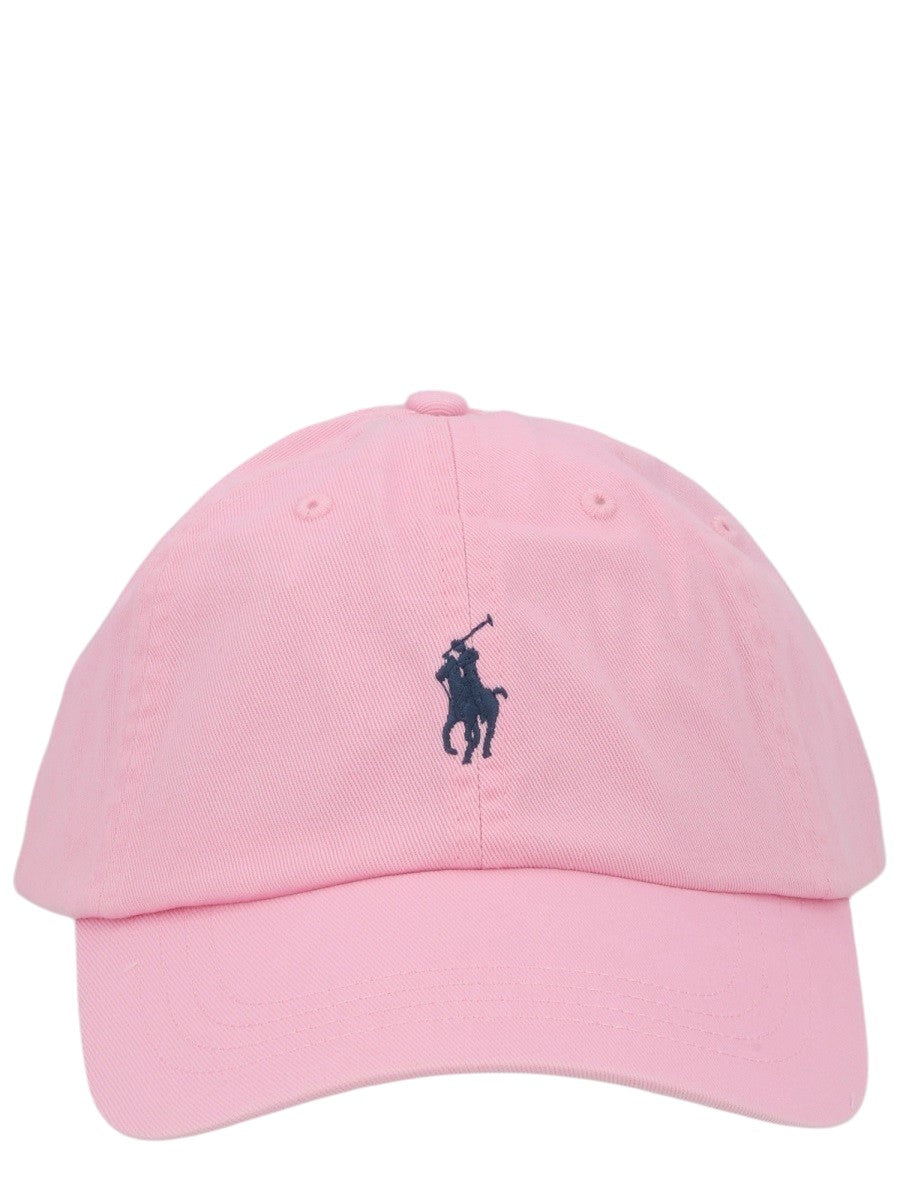 Front view of Polo Ralph Lauren cotton chino baseball cap in pink featuring the embroidered signature Pony logo and curved brim.