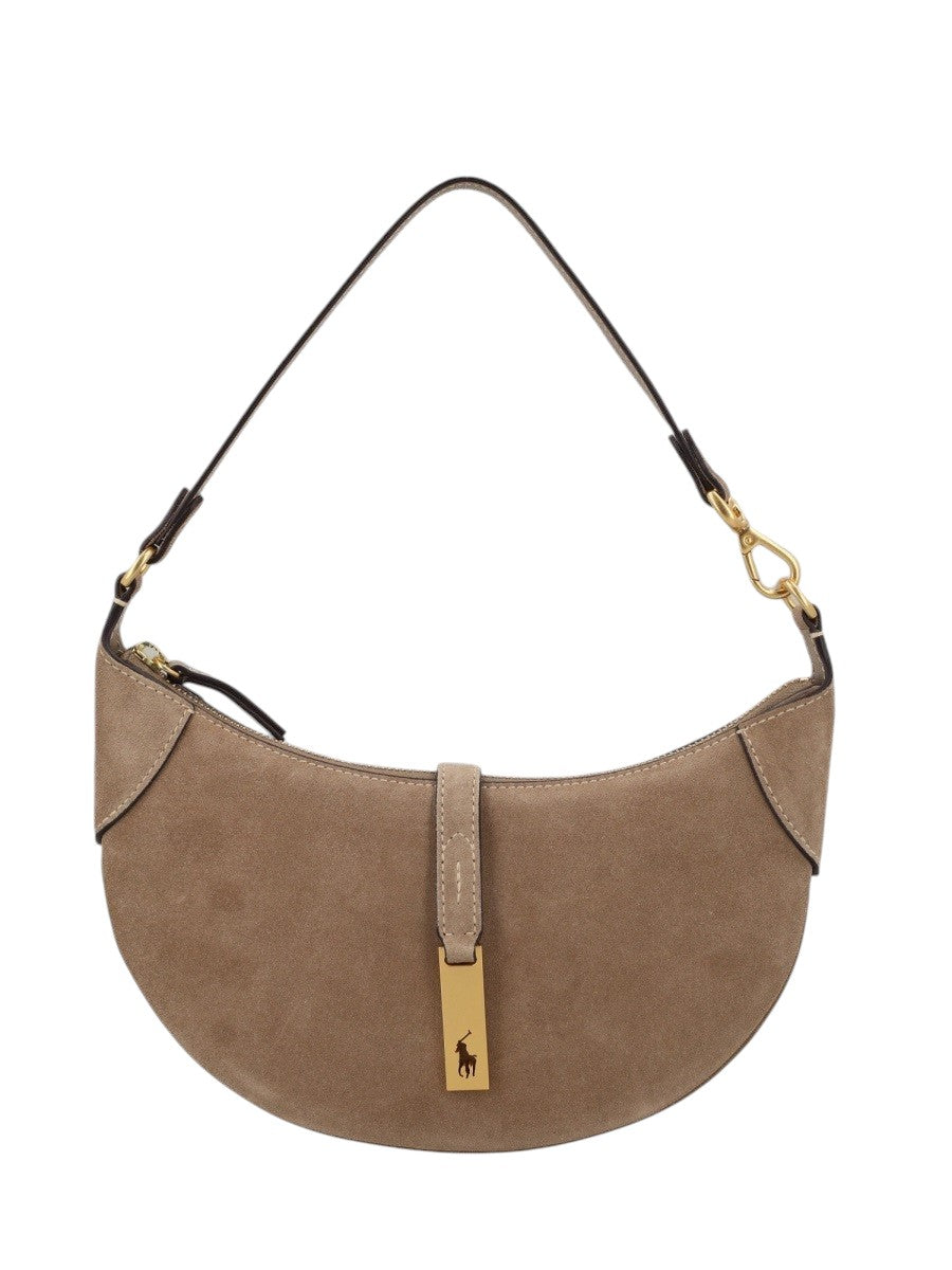 Polo Ralph Lauren small leather shoulder bag in taupe featuring curved silhouette, gold-tone hardware and front logo charm.