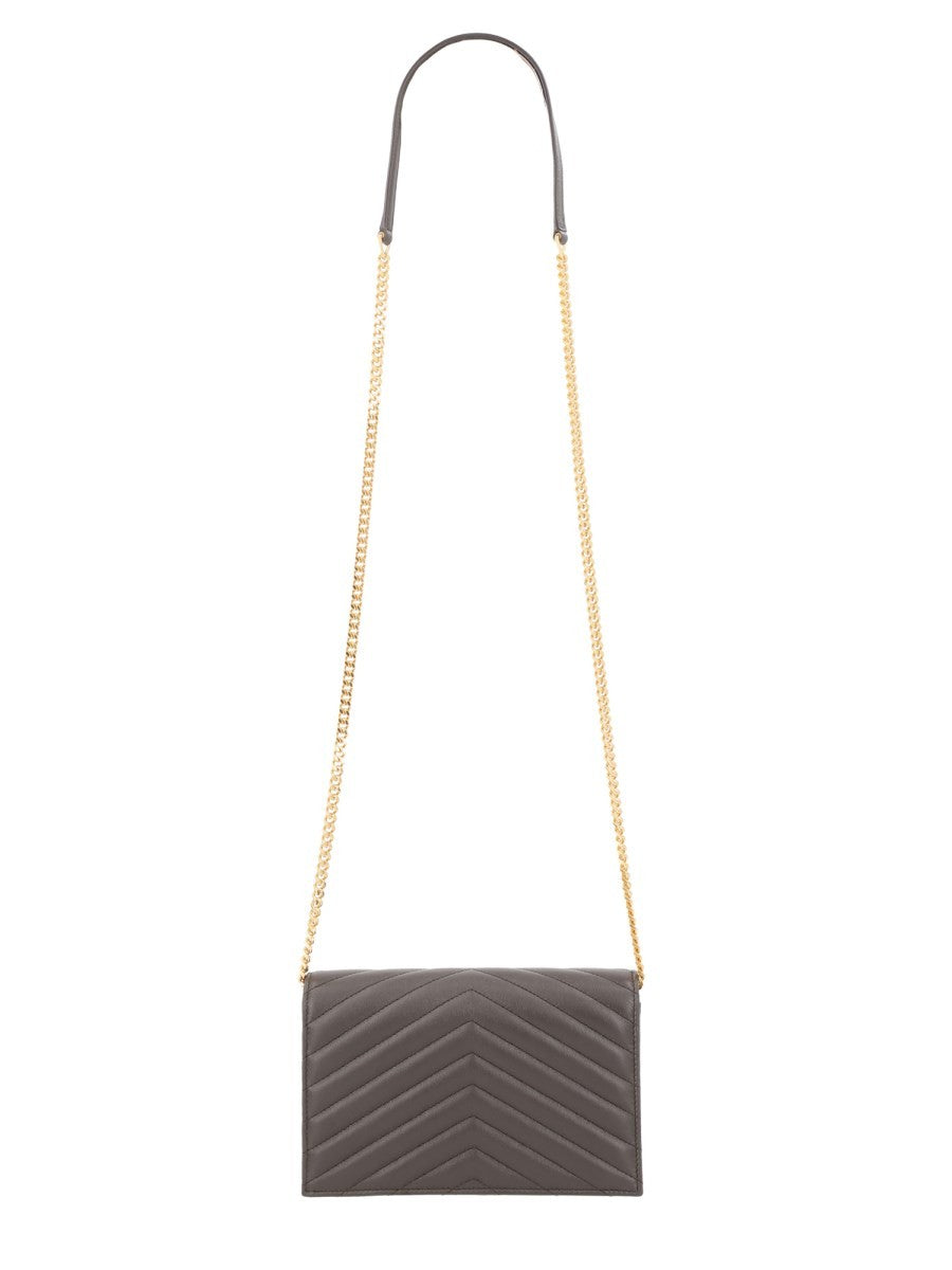 Saint Laurent - PORTAFOGLIO CON CATENA "ENVELOPE CASSANDRE" portafoglio-con-catena-envelope-cassandre_e7f29a71-de6d-47bf-b683-83207d7adff8