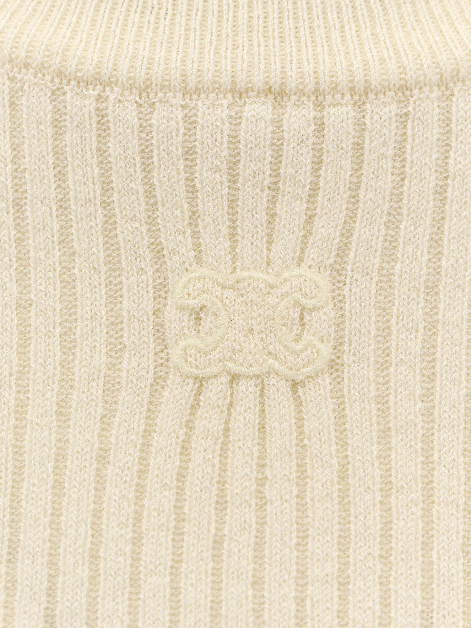 Ribbed stretch wool turtleneck sweater