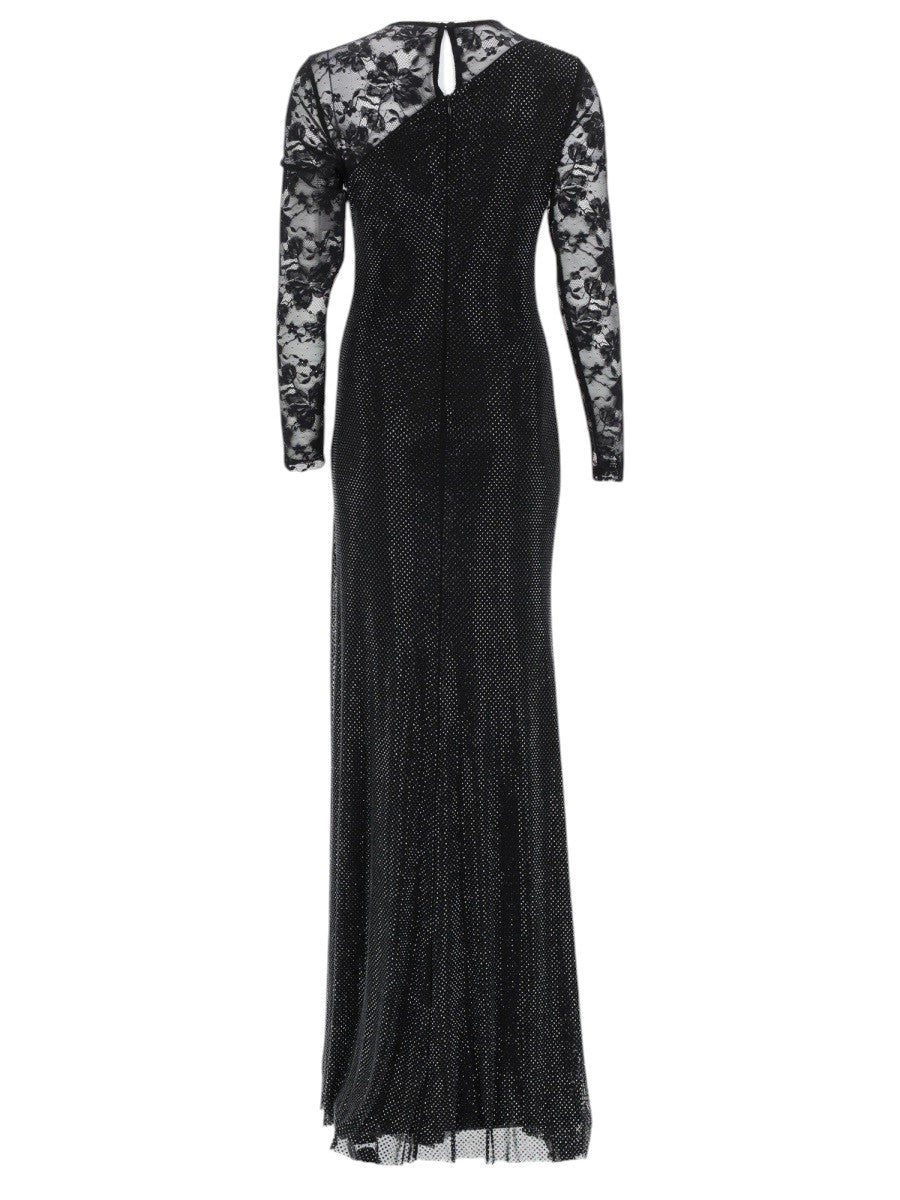 Back view of the Self-Portrait black rhinestone lace-trimmed gown with sheer lace long sleeves, fitted silhouette and floor-length maxi hem.