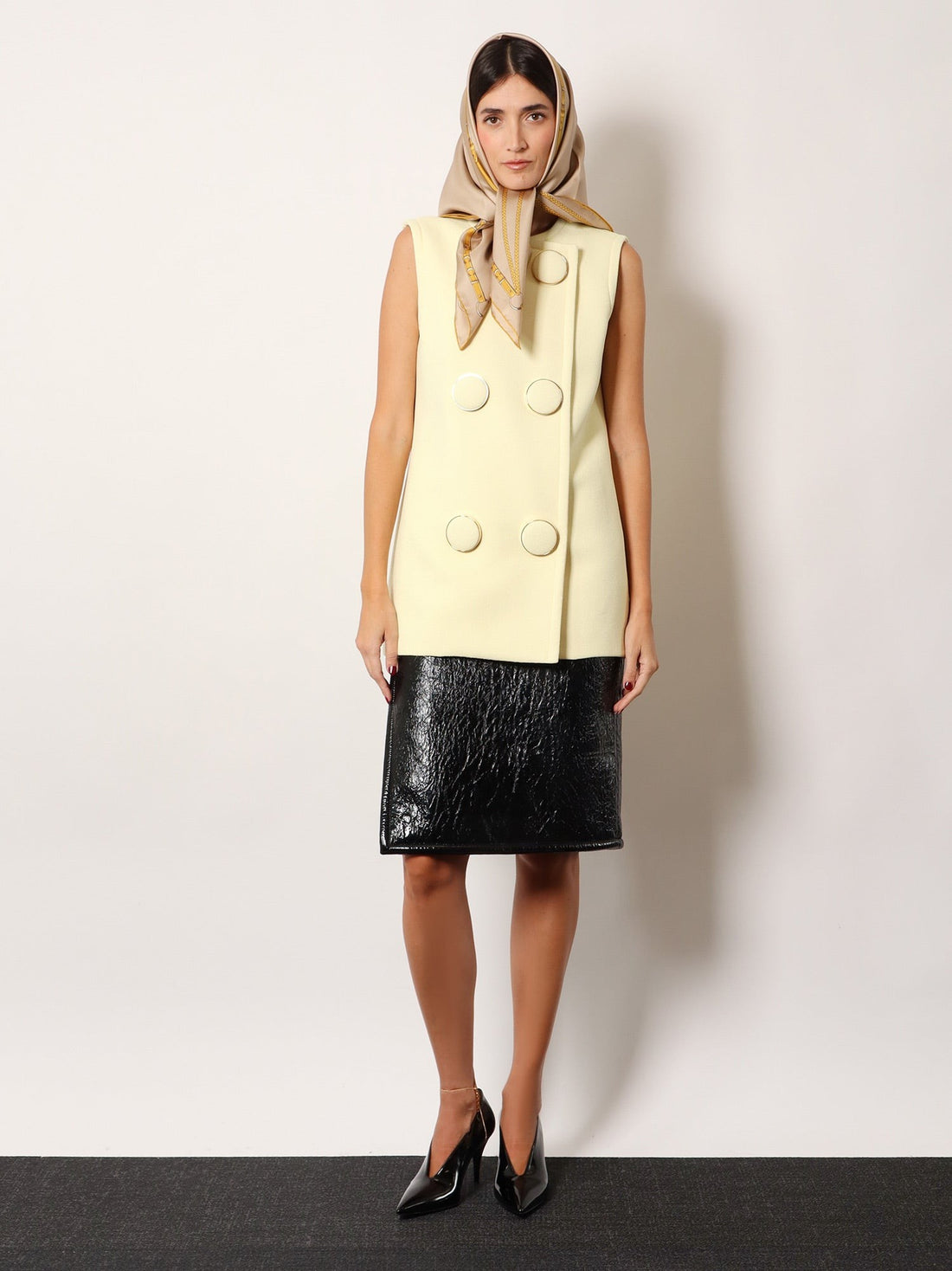 Shiny leather and neoprene skirt