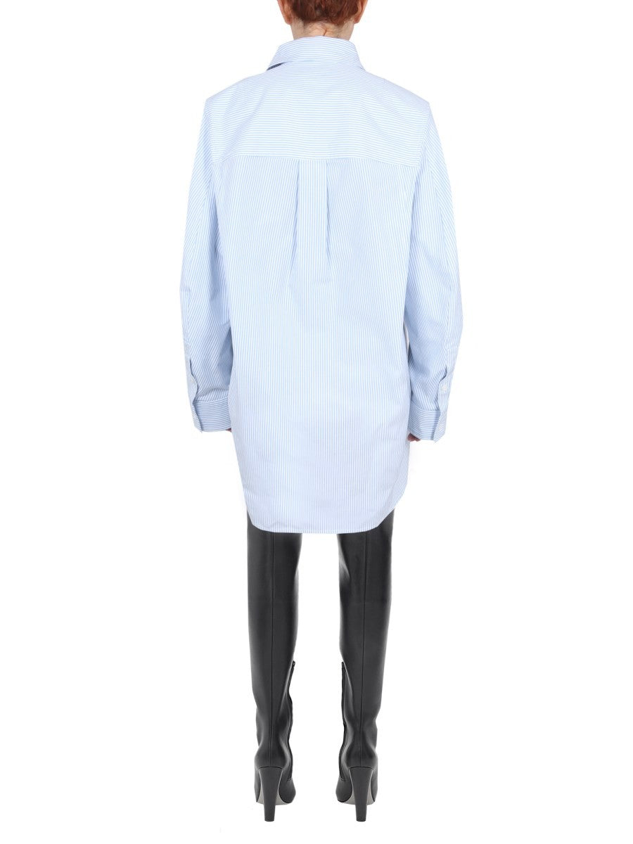 SHIRT WITH CURVED BACK