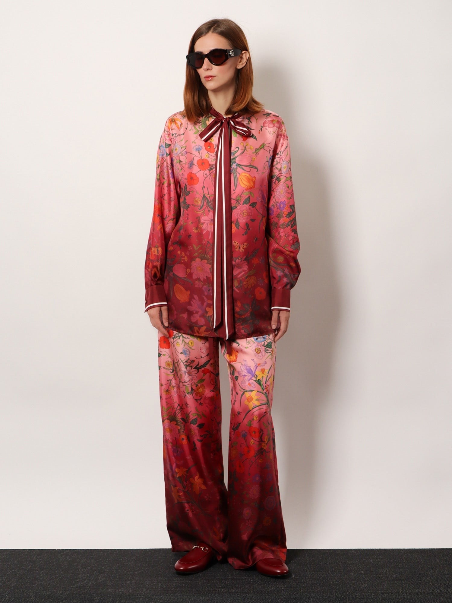 Silk trousers with Gucci Flora print