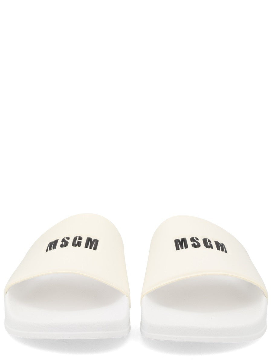 msgm - SLIDE CON LOGO slide-con-logo_064c45f0-0c9a-4a2f-ae84-f555fbf2c937