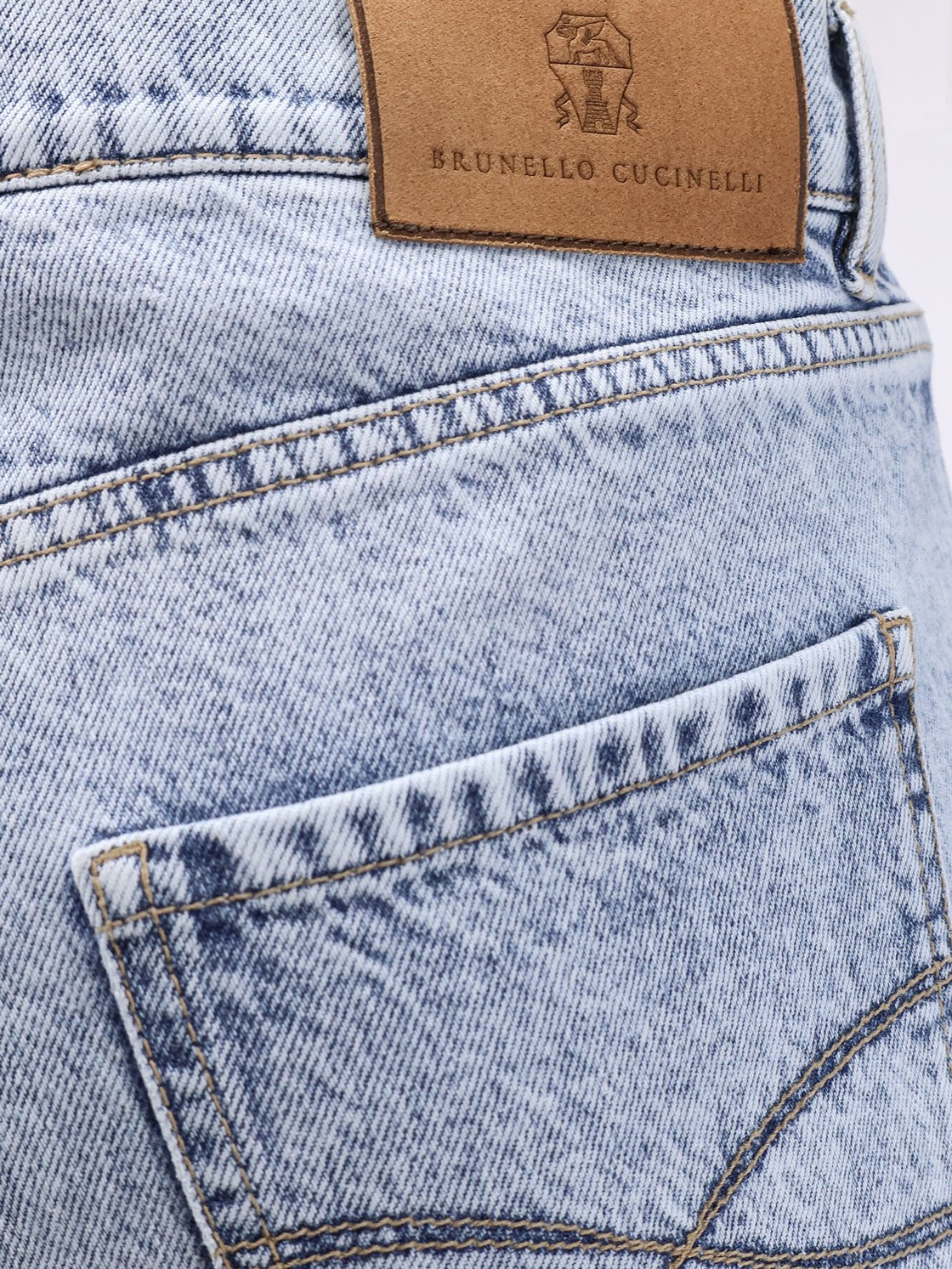 Stone-washed denim jeans