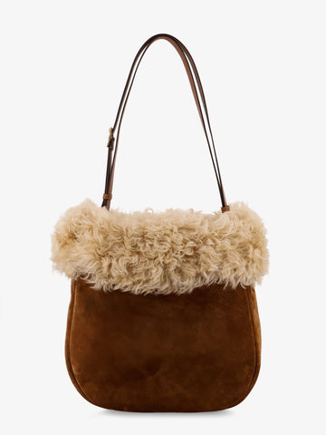Suede shoulder bag with shearling profile