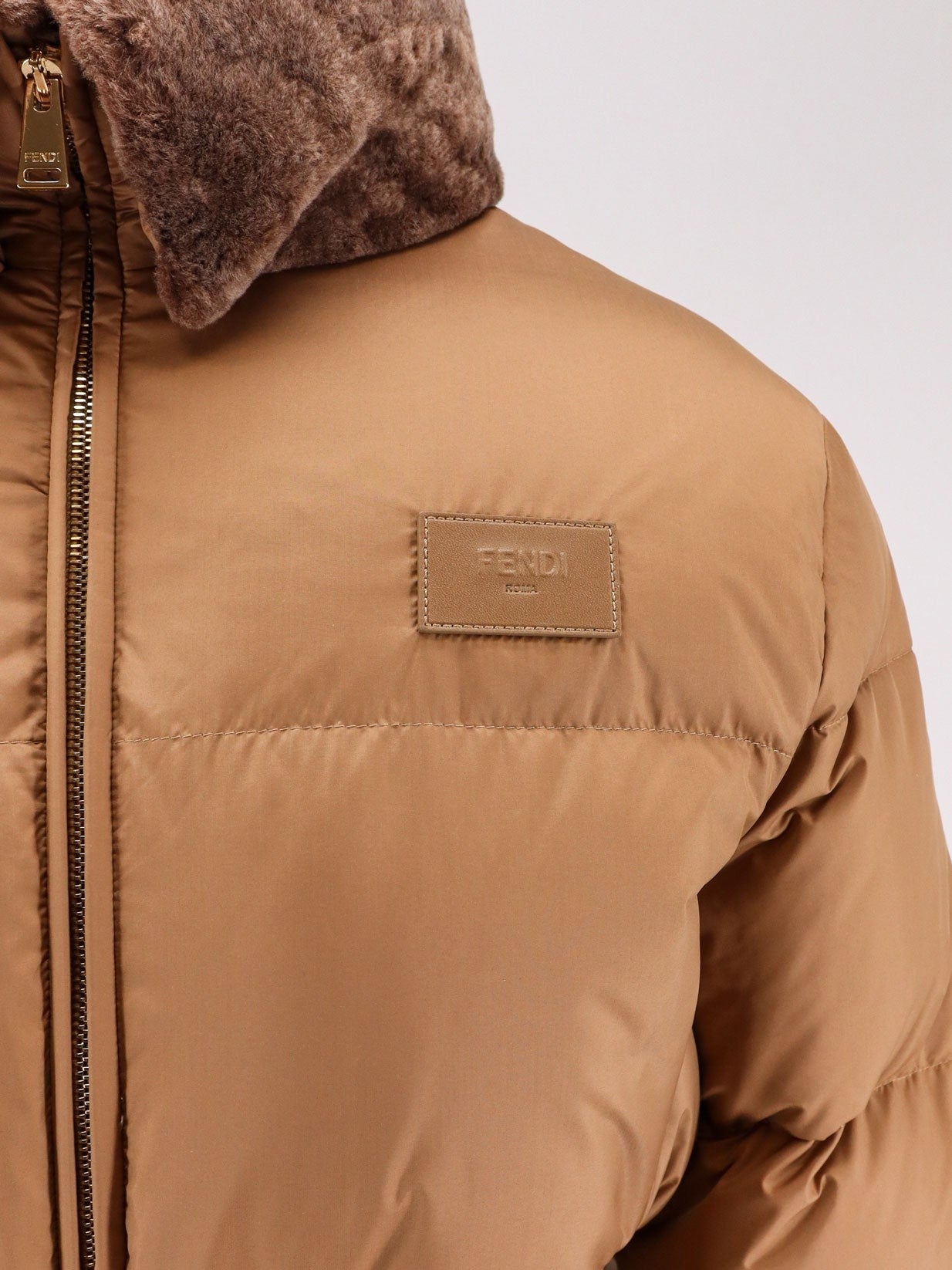 Technical fabric and shearling down jacket