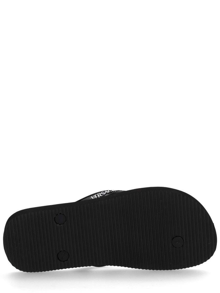 Versace Jeans Couture - THONG SANDAL WITH LOGO thong-sandal-with-logo_1aac92e8-0618-4ebb-a5db-aa1a690ae854