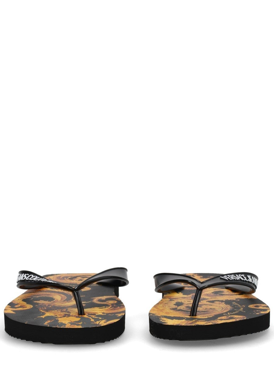 Versace Jeans Couture - THONG SANDAL WITH LOGO thong-sandal-with-logo_318dd8ae-49f9-49e8-8bb3-e996b1185422