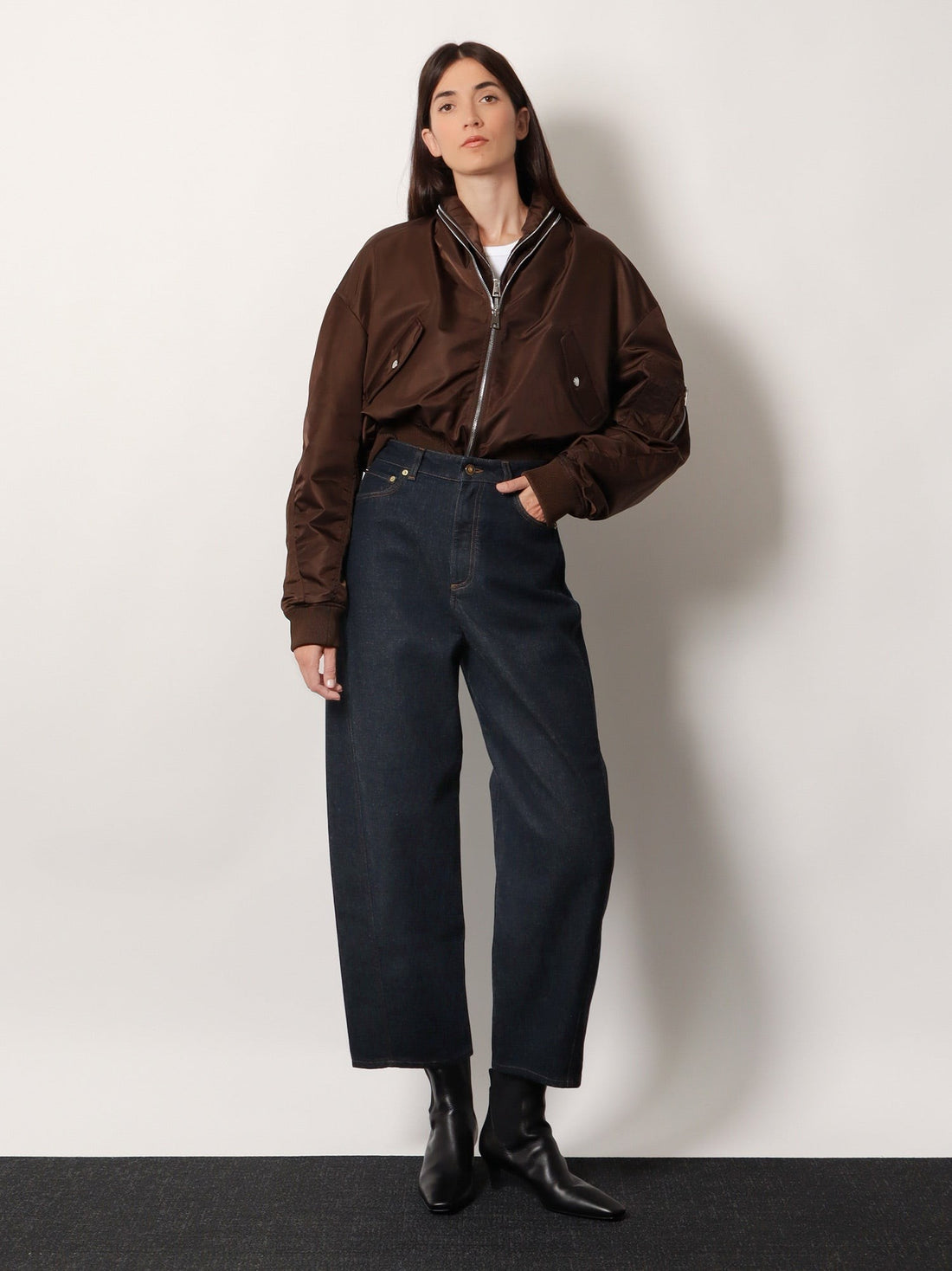 Twisted dark blue denim jeans