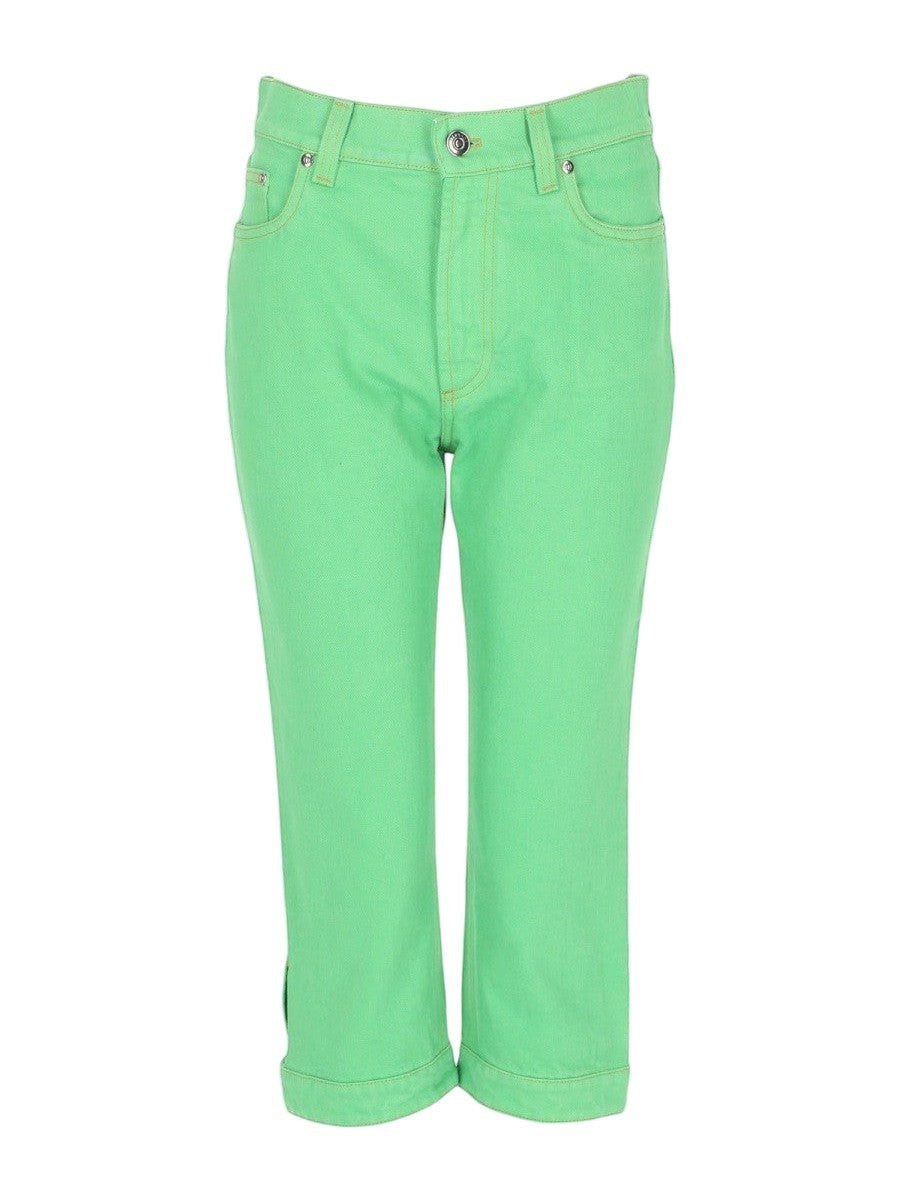 Versace Capri jeans in bright green denim with straight cropped leg, front button closure, belt loops and classic five-pocket construction.