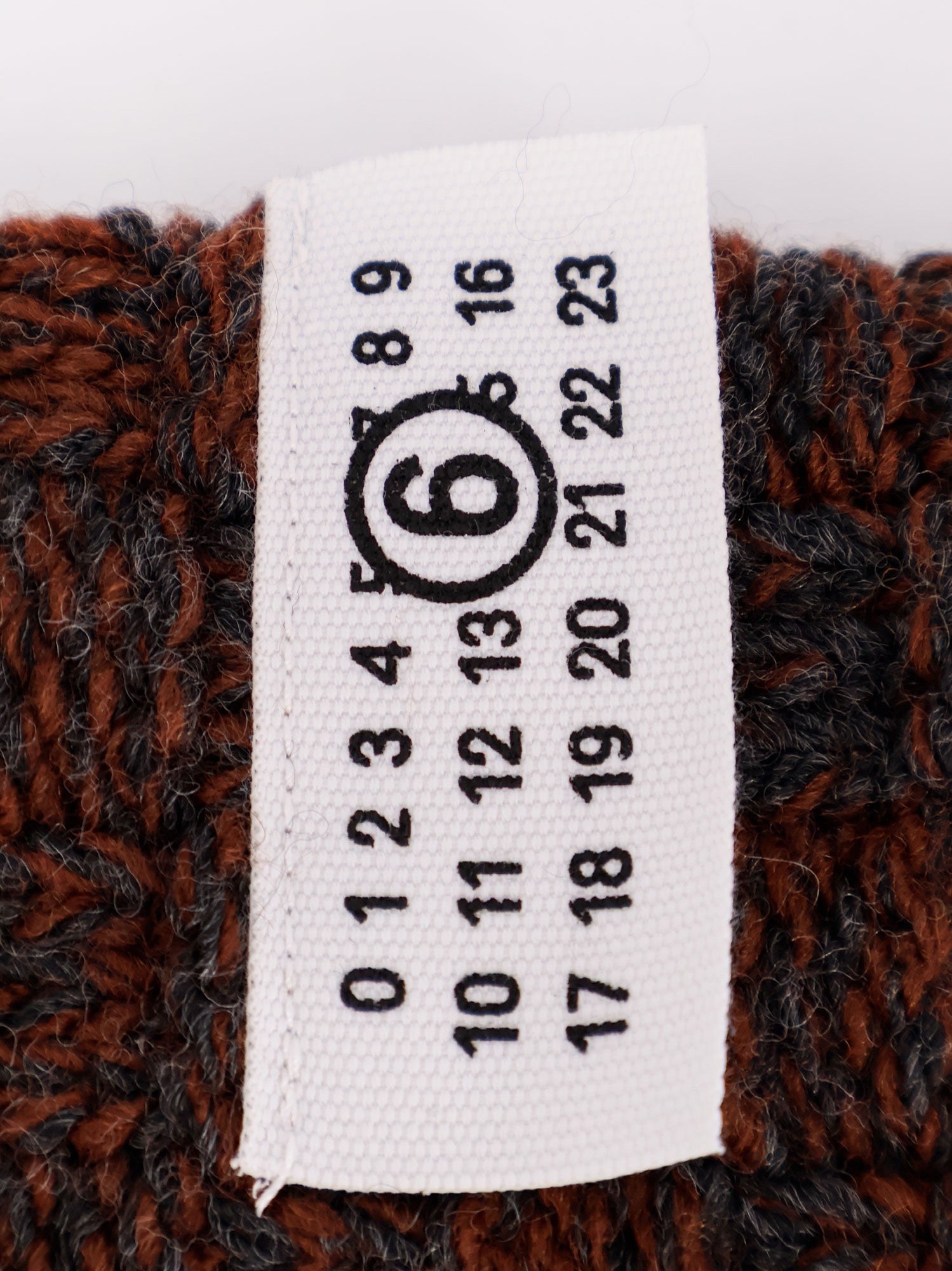 Wool blend scarf with distressed effect