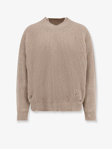 Wool blend sweater with distressed effect