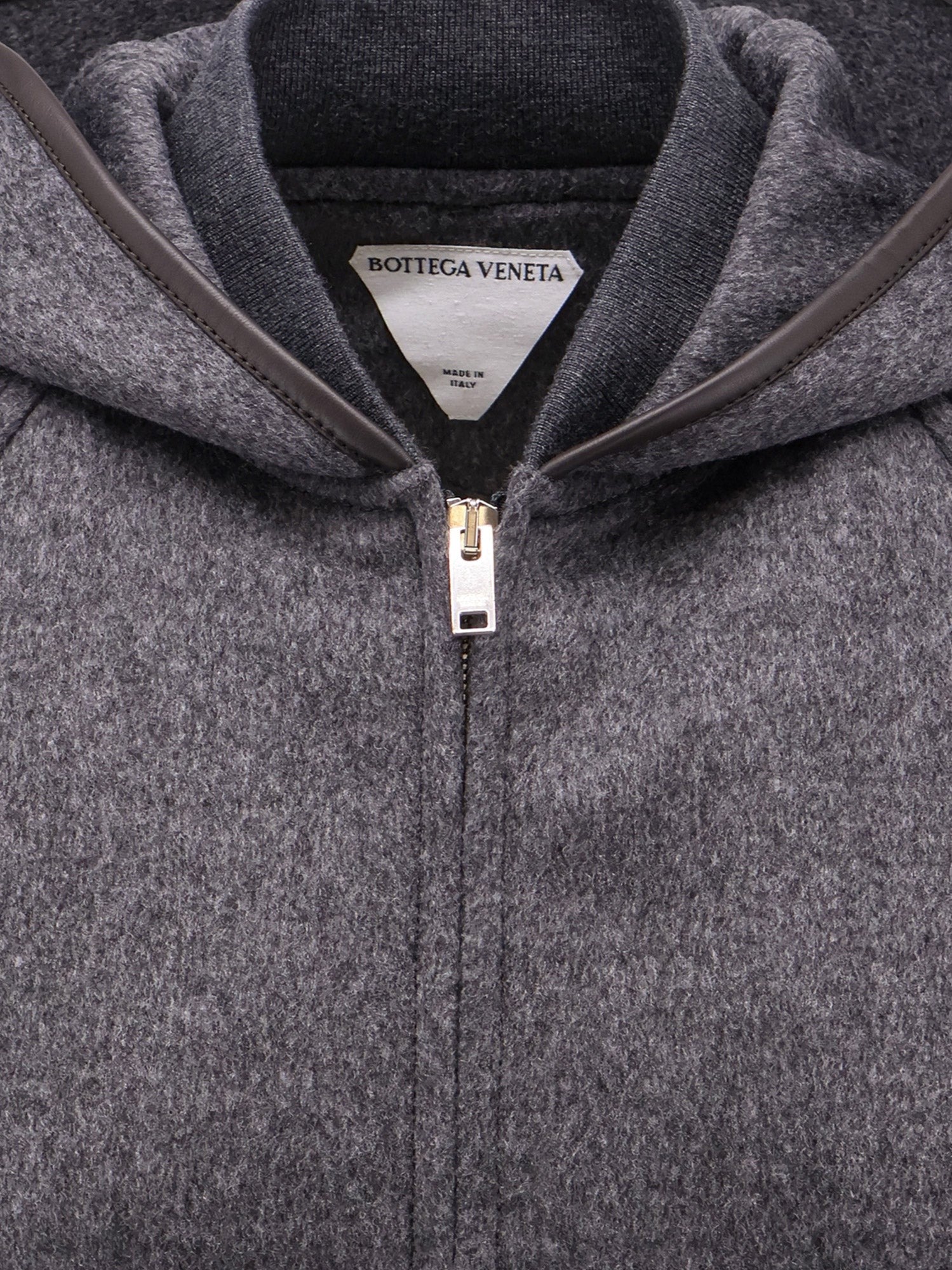 Wool jacket with leather profiles