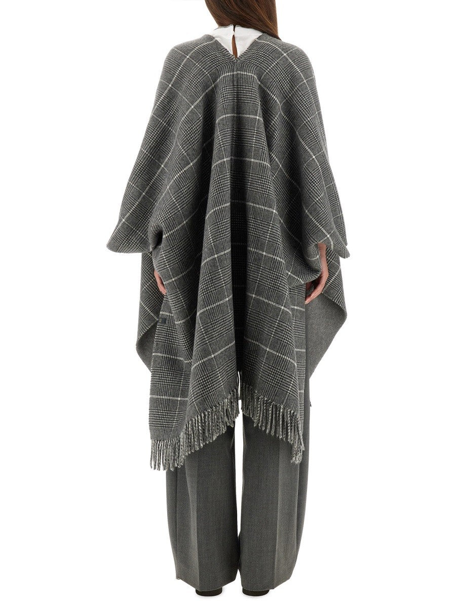 WOOL PONCHO WITH BANGS